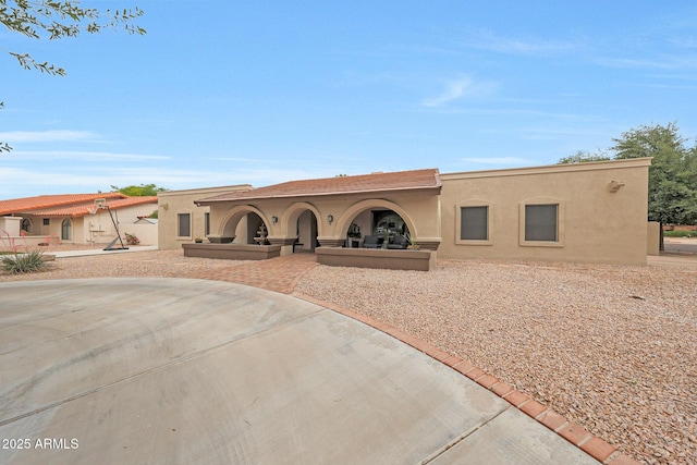 1444 E Myrna Ln, Tempe, AZ 85284 - mediterranean / spanish-style home featuring stucco siding