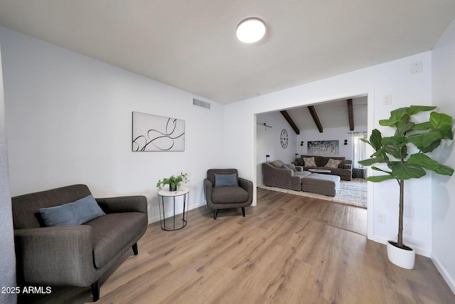 1444 E Myrna Ln, Tempe, AZ 85284 - living area with light wood-style flooring and baseboards