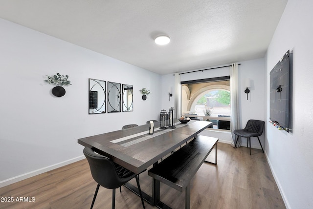 1444 E Myrna Ln, Tempe, AZ 85284 - dining room featuring baseboards and light wood finished floors