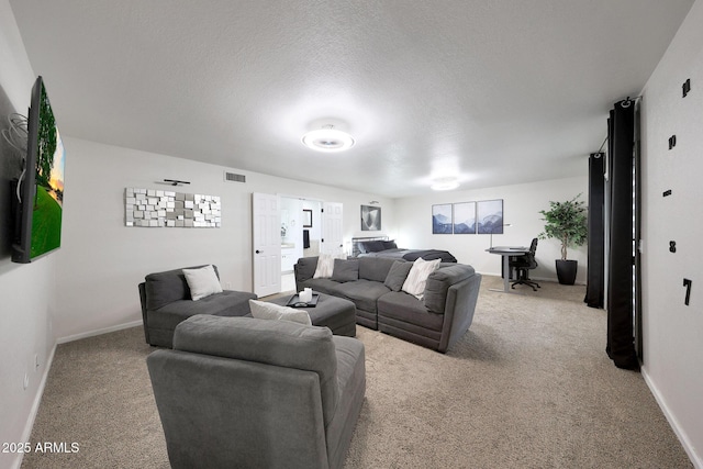 1444 E Myrna Ln, Tempe, AZ 85284 - carpeted living area with baseboards and a textured ceiling