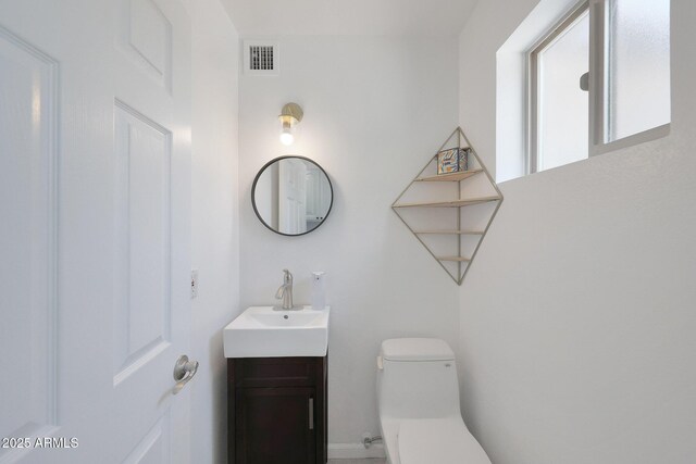 1444 E Myrna Ln, Tempe, AZ 85284 - half bath featuring vanity and toilet