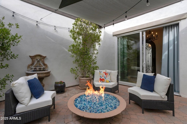 9608 N 184th Ln, Waddell, AZ 85355 - view of patio / terrace featuring an outdoor fire pit