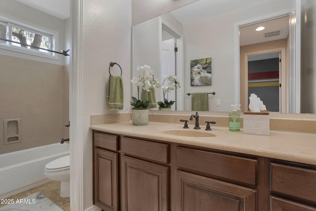 9608 N 184th Ln, Waddell, AZ 85355 - bathroom with toilet, vanity, tile patterned flooring, and shower / tub combination