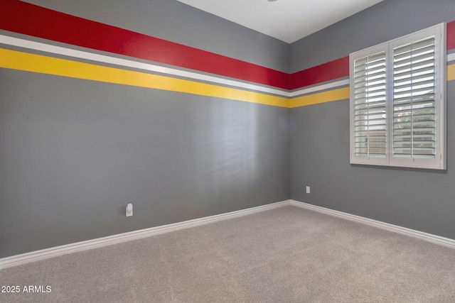 9608 N 184th Ln, Waddell, AZ 85355 - carpeted spare room featuring baseboards