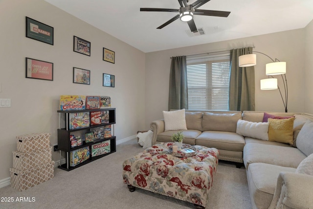 9608 N 184th Ln, Waddell, AZ 85355 - living room with carpet flooring, a ceiling fan, and baseboards
