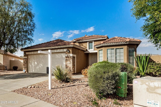 view of front of property with a garage