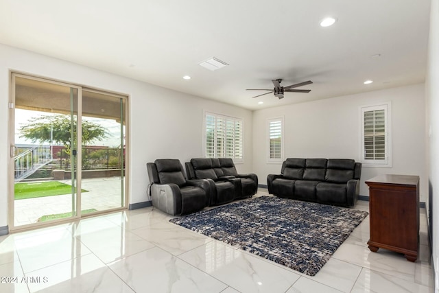 living room featuring ceiling fan