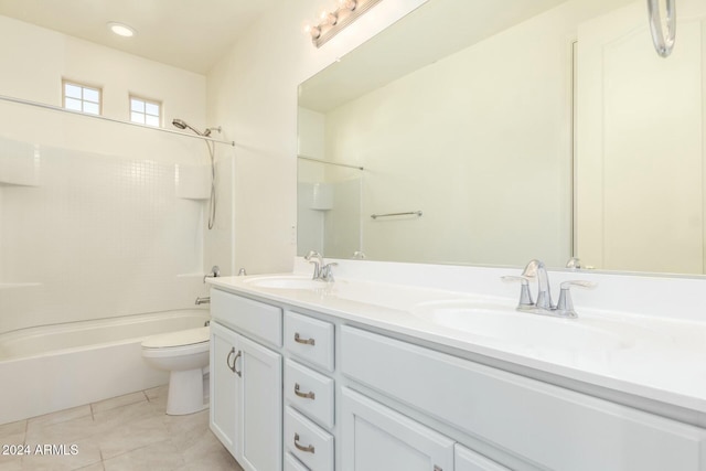 full bathroom featuring tile patterned flooring, vanity, toilet, and shower / washtub combination