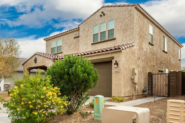 view of front of property with a garage