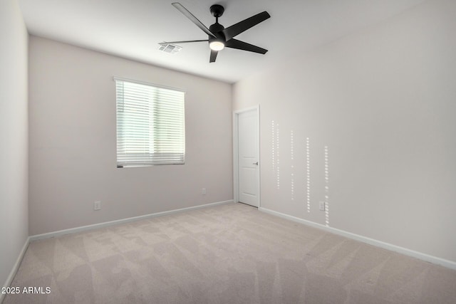 unfurnished bedroom with ceiling fan and light carpet