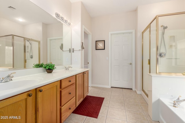 bathroom featuring tile patterned flooring, plus walk in shower, and vanity