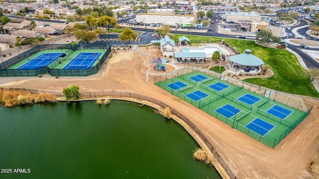 birds eye view of property featuring a water view