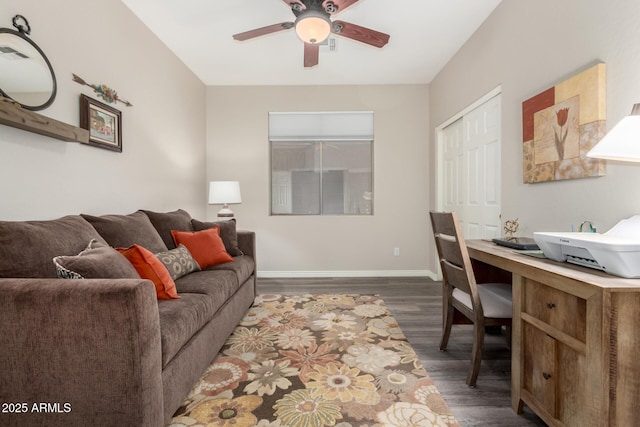 office space featuring dark wood-type flooring and ceiling fan