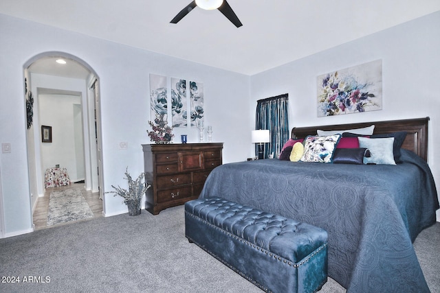 bedroom featuring ceiling fan and carpet flooring