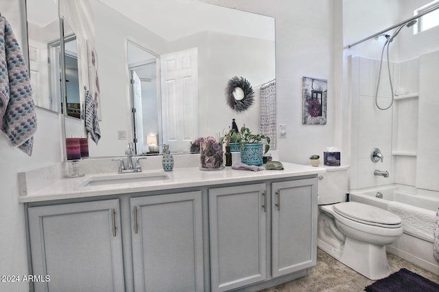 full bathroom with vanity, shower / tub combo, and toilet