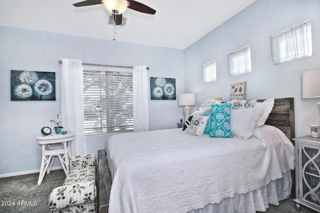 bedroom featuring dark colored carpet and ceiling fan