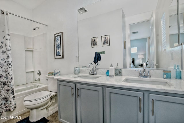 full bathroom with shower / bath combination with curtain, vanity, tile patterned flooring, and toilet