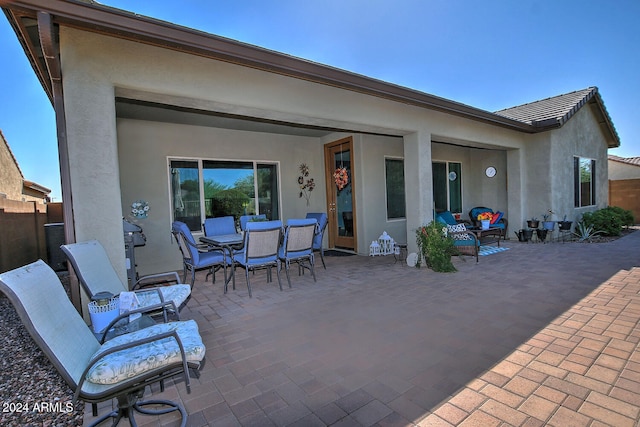 back of house featuring a patio