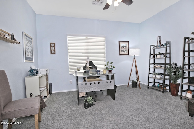 carpeted office featuring ceiling fan