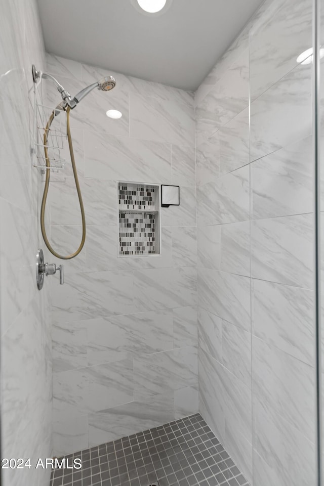bathroom featuring a stall shower