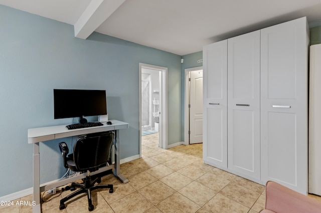 home office featuring beam ceiling and light tile patterned floors