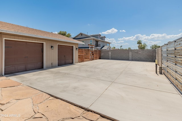 garage featuring fence