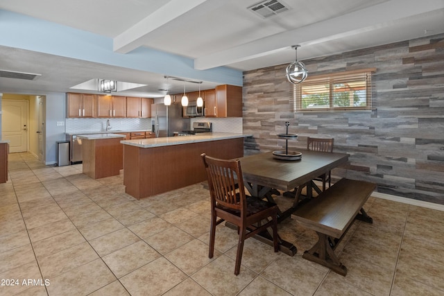 dining area with visible vents, light tile patterned floors, and beam ceiling