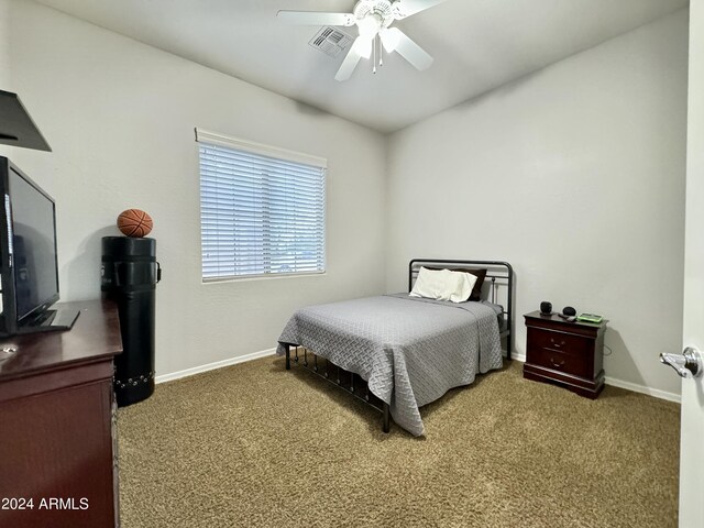 carpeted bedroom featuring ceiling fan