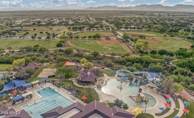 birds eye view of property featuring a mountain view