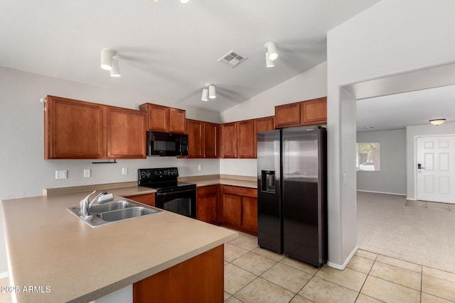 5320 E Silverbell Rd, San Tan Valley, AZ 85143 - kitchen with black appliances, a sink, light tile patterned flooring, light countertops, and lofted ceiling