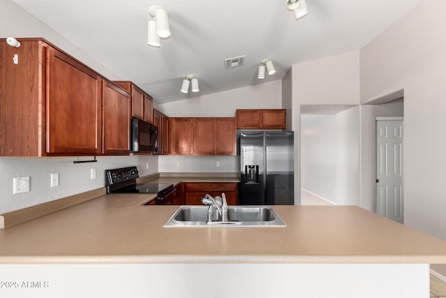5320 E Silverbell Rd, San Tan Valley, AZ 85143 - kitchen featuring black appliances, a sink, vaulted ceiling, a peninsula, and light countertops