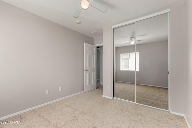 5320 E Silverbell Rd, San Tan Valley, AZ 85143 - unfurnished bedroom featuring carpet flooring, a closet, baseboards, and ceiling fan