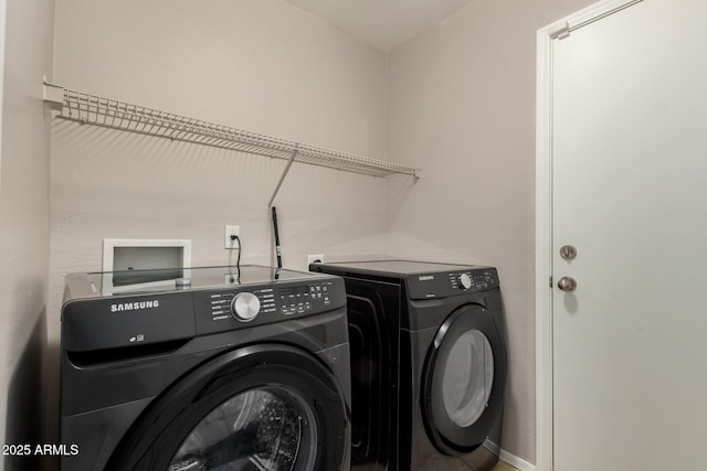 5320 E Silverbell Rd, San Tan Valley, AZ 85143 - washroom featuring washer and clothes dryer and baseboards