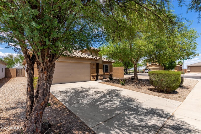 5320 E Silverbell Rd, San Tan Valley, AZ 85143 - view of front of property featuring driveway, a garage, a tile roof, and stucco siding