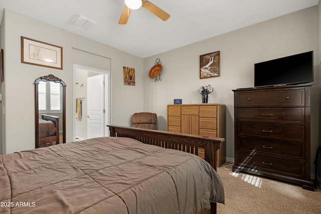 bedroom featuring light colored carpet, ceiling fan, and visible vents