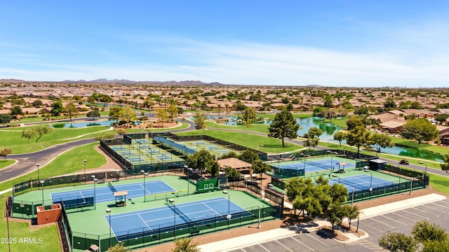 aerial view featuring a residential view and a water and mountain view