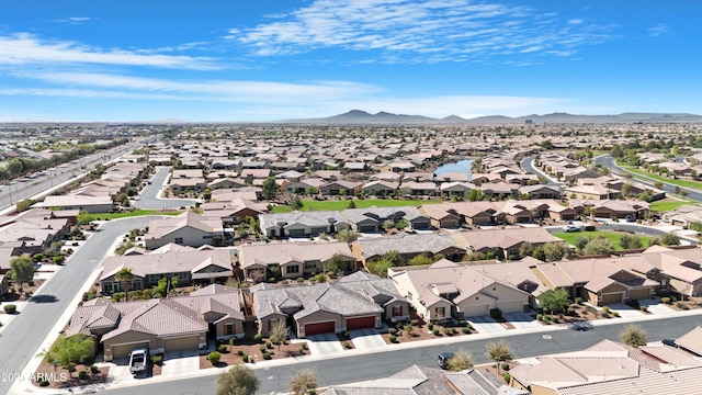 birds eye view of property featuring a residential view and a mountain view