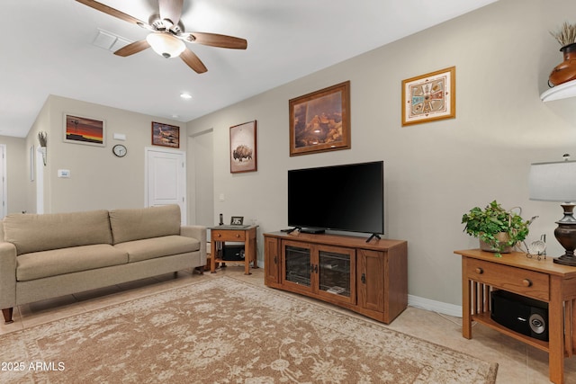 living room featuring light tile patterned floors, baseboards, a ceiling fan, and recessed lighting