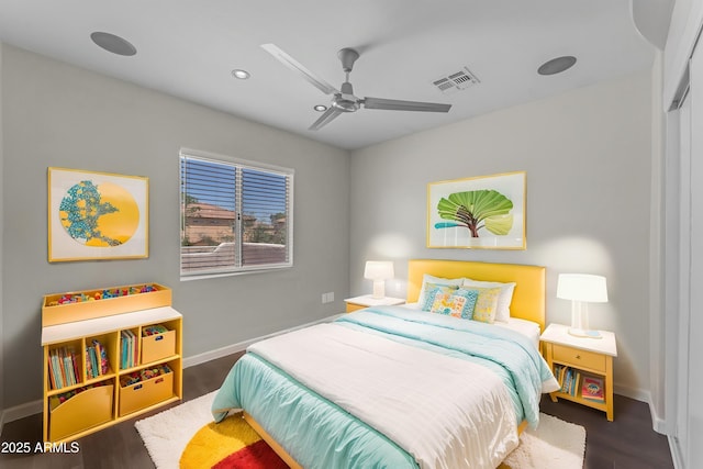 bedroom with ceiling fan, visible vents, wood finished floors, baseboards, and recessed lighting