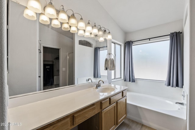 13438 N 130th Ln, El Mirage, AZ 85335 - full bath with a bath, vanity, and wood finished floors