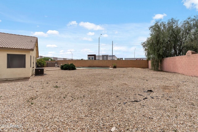 13438 N 130th Ln, El Mirage, AZ 85335 - fenced backyard featuring central air condition unit