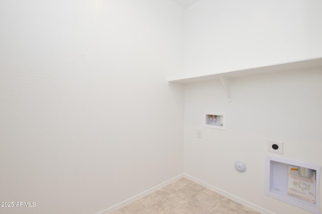 clothes washing area with laundry area, baseboards, gas dryer hookup, hookup for an electric dryer, and washer hookup