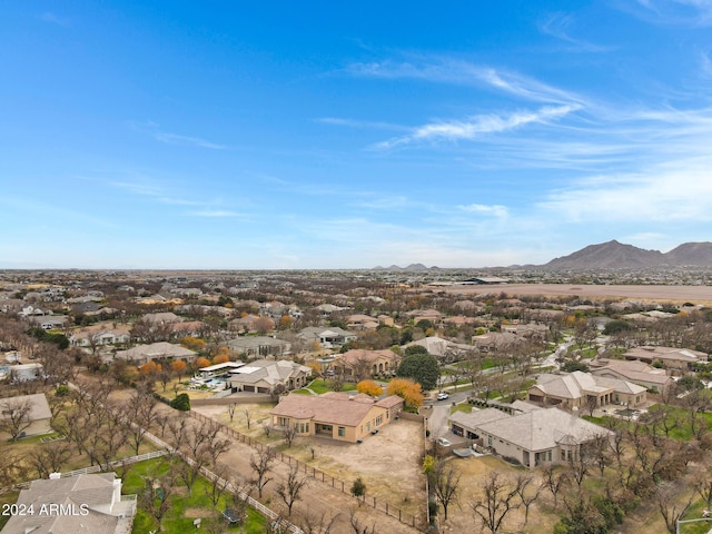 drone / aerial view featuring a residential view and a mountain view