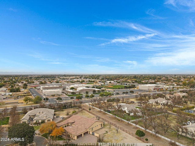 birds eye view of property with a residential view