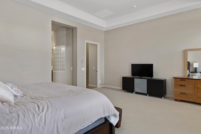 bedroom featuring baseboards and light colored carpet