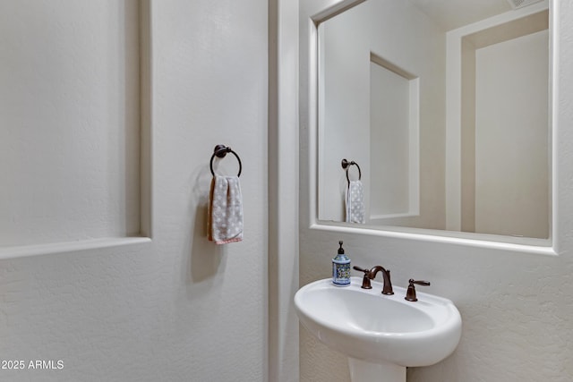 bathroom featuring a sink