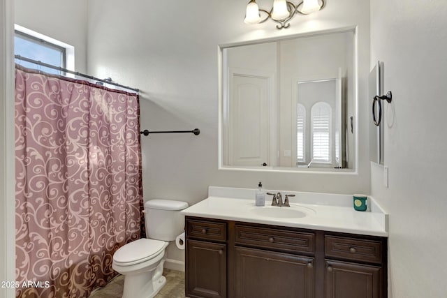 full bath with vanity and toilet