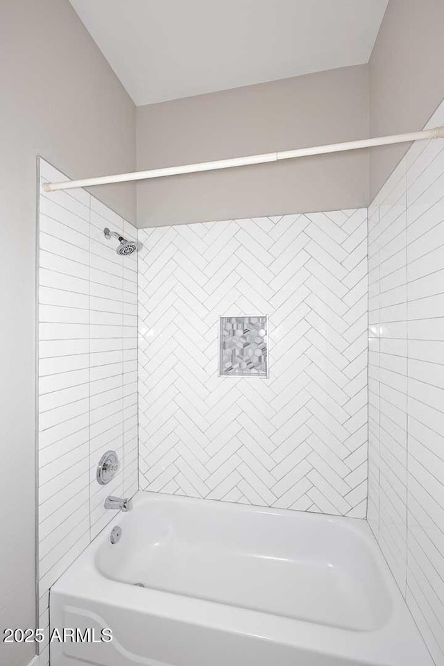 bathroom with shower / tub combination