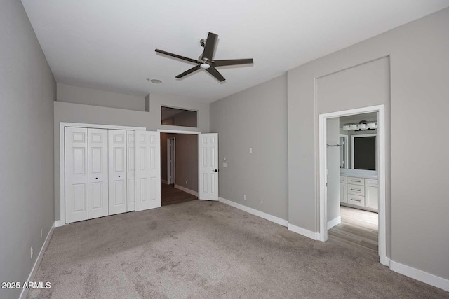 unfurnished bedroom featuring baseboards, ceiling fan, and carpet flooring