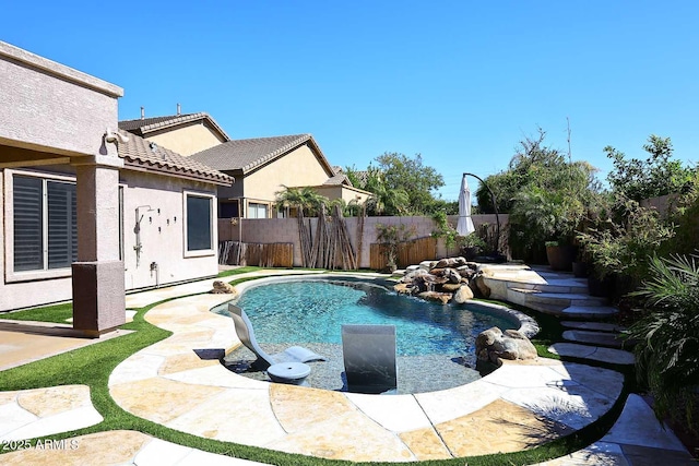 view of pool with a fenced in pool and a fenced backyard